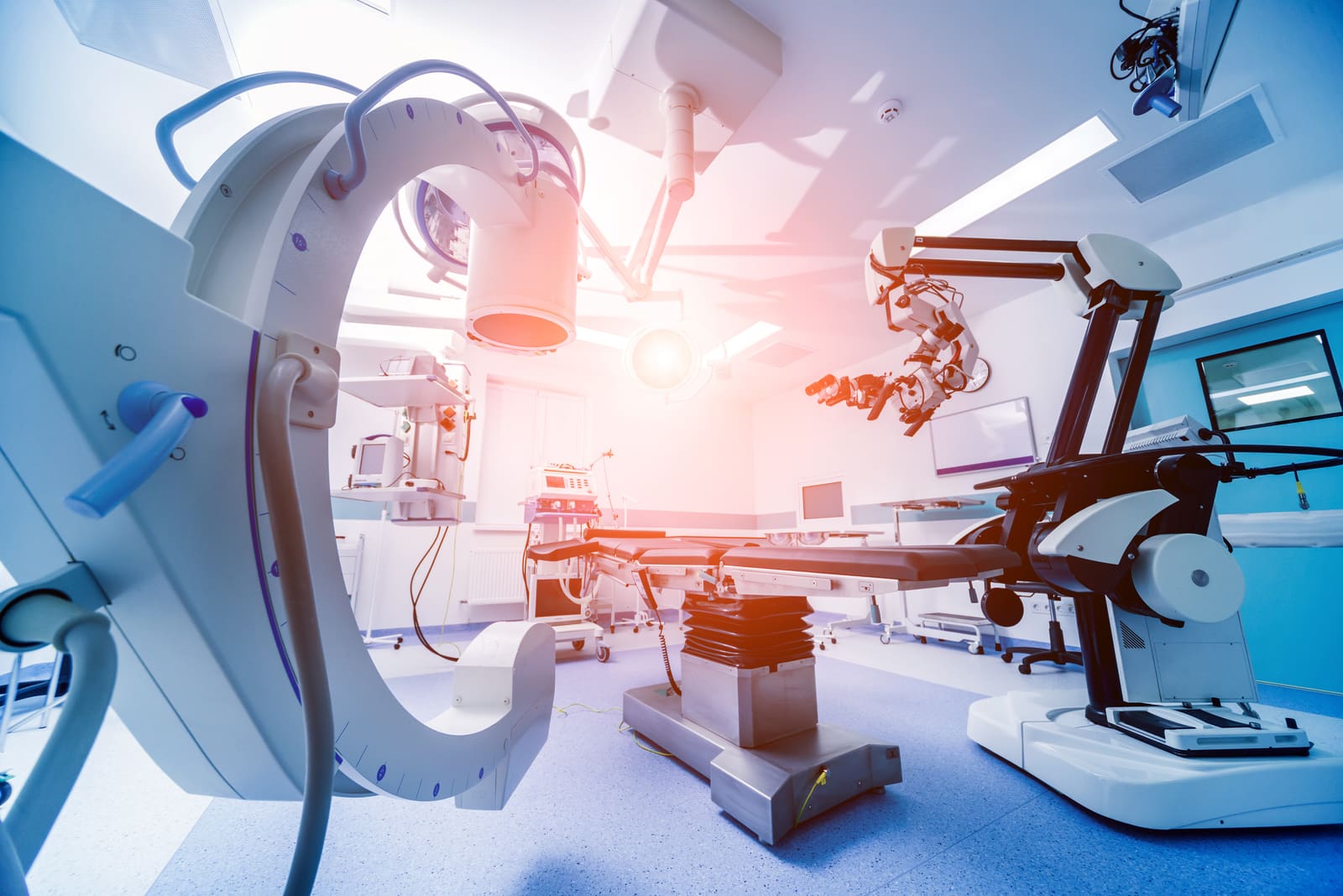 A C-arm imaging system and surgical lights in an operating room